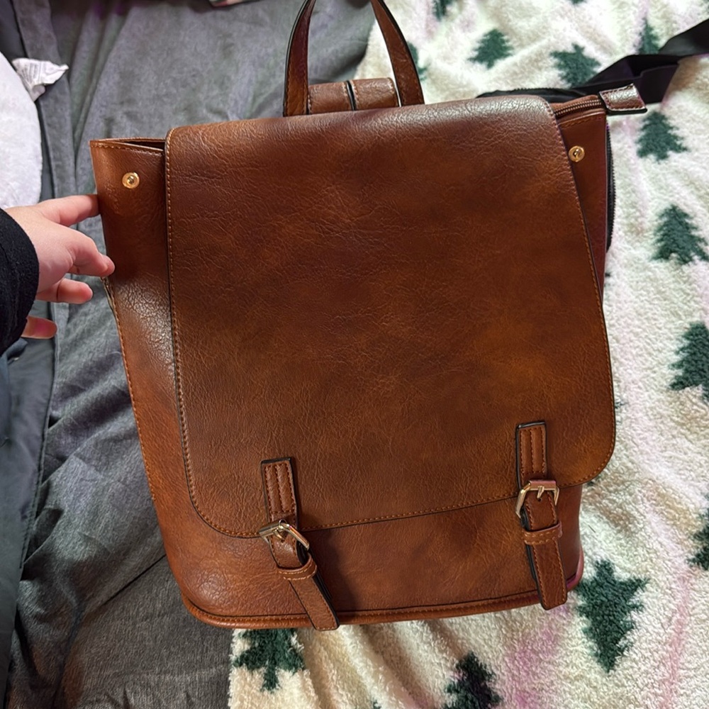 Gently used leather backpack